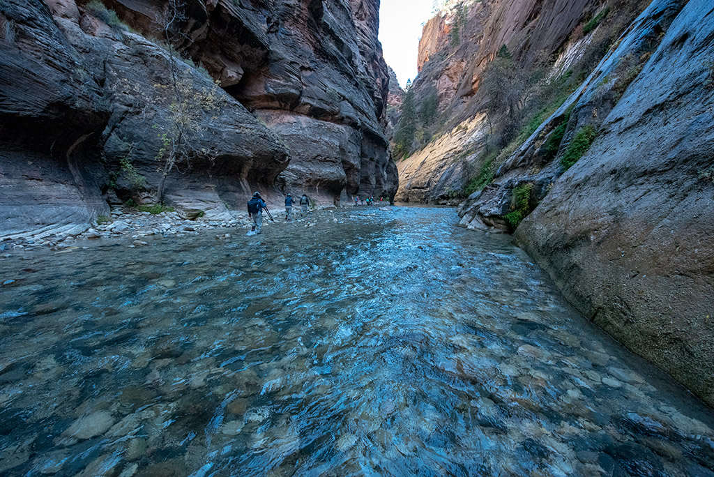 People hike the Narrows.