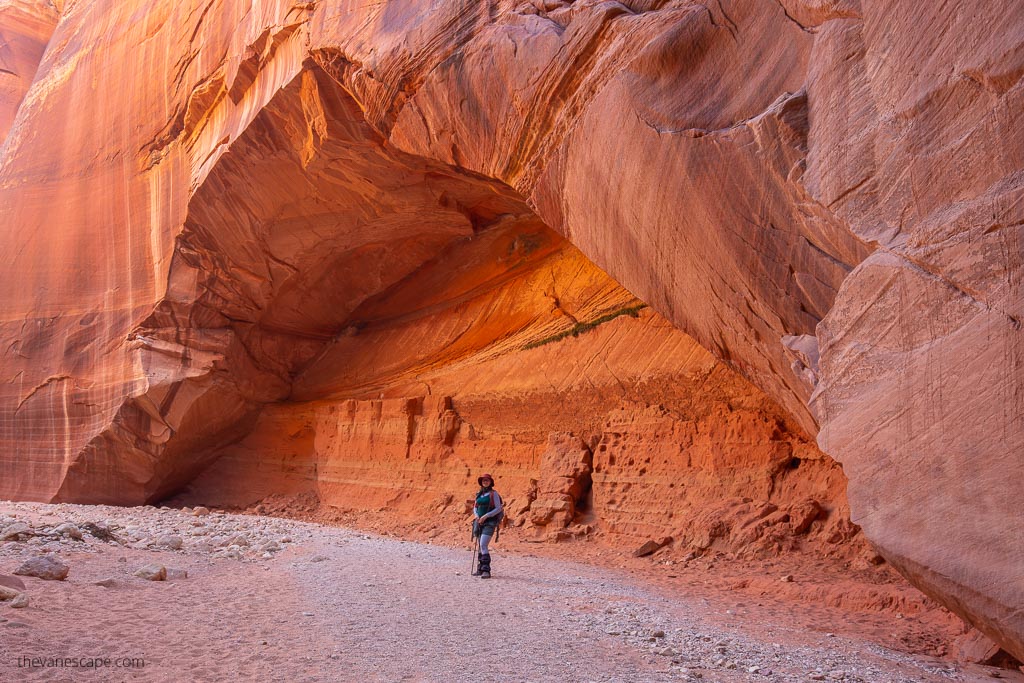 Agnes Stabinska, the author and owner of this blog on Buckskin Gulch Day Hike among oranges rock walls.