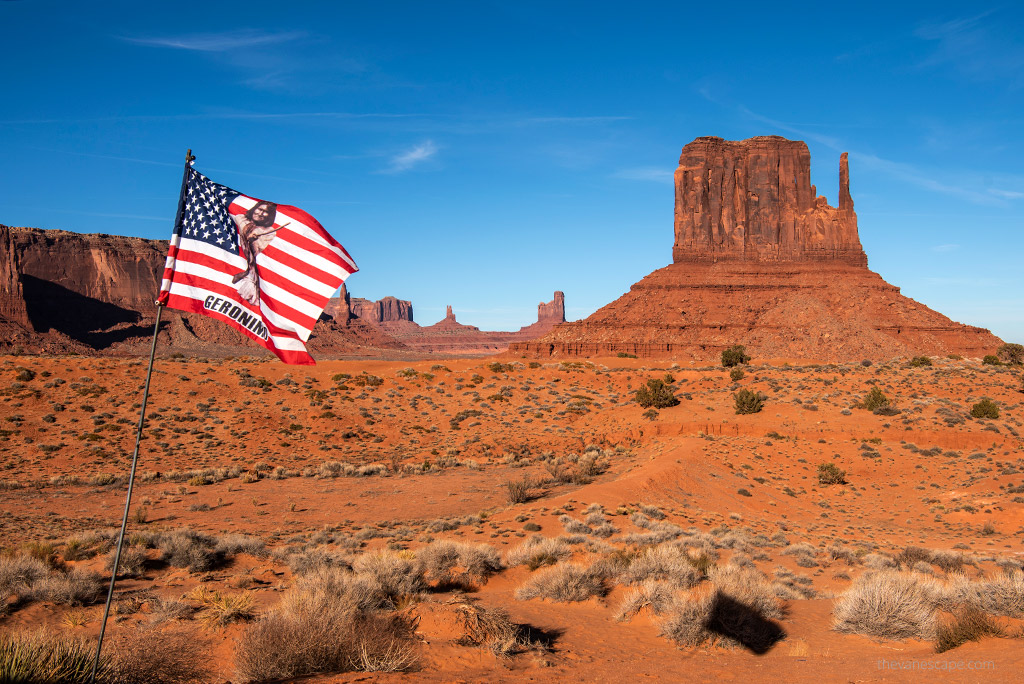 Monument Valley with the American flag.