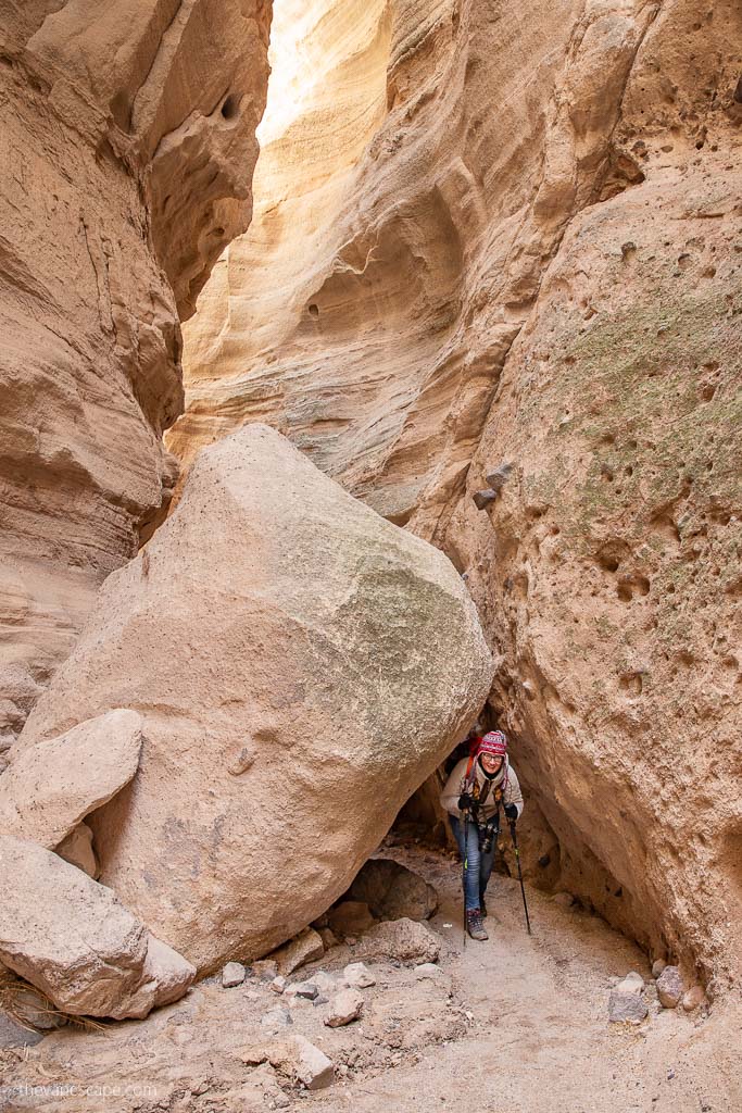Agnes Stabinska the author during tent rocks slot canyon hike - she is between narrow walls.