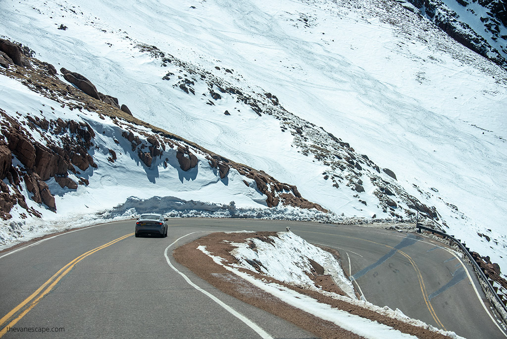 car on the sharp bend on Pikes Peak Highway