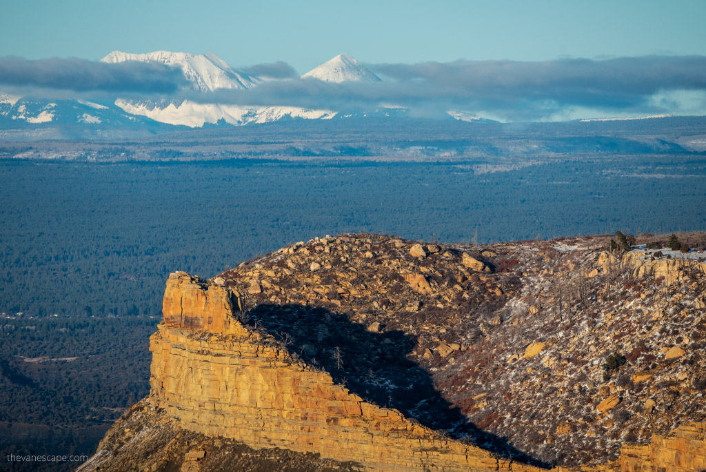the view from Mesa Verde National Park: mountains in the backdrop.