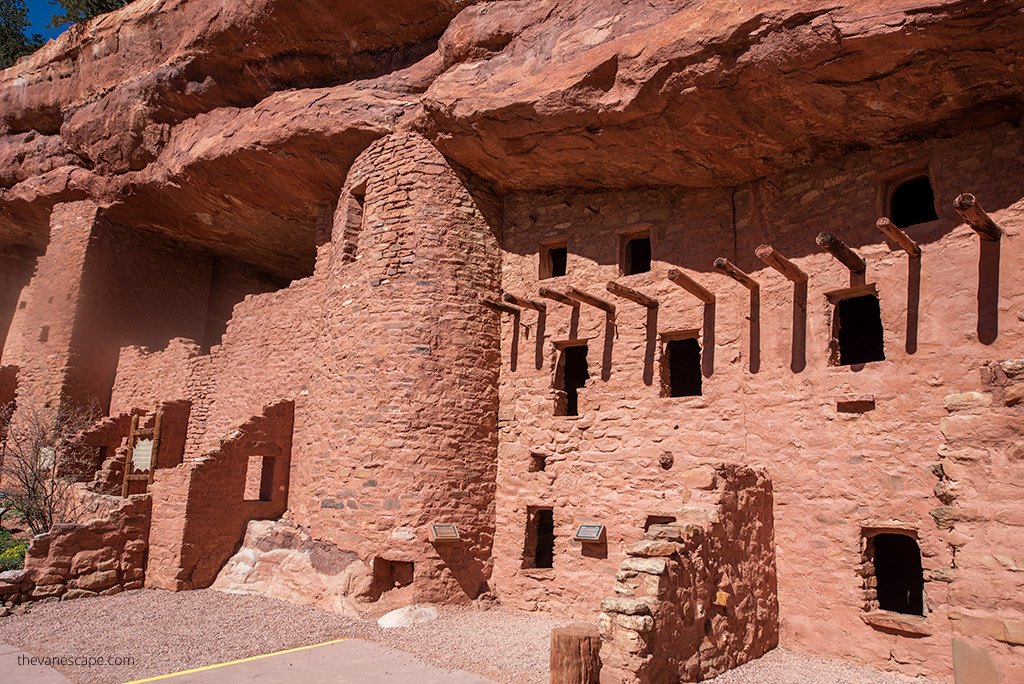 orange buildlings in the rock in Manitou Cliff Dwellings