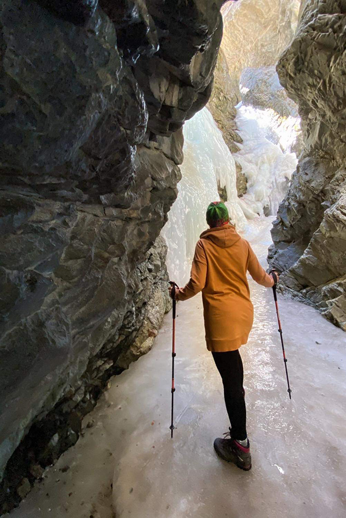 Agnes Stabinska, the author, in Zapata Falls, the water in falls is frozen.