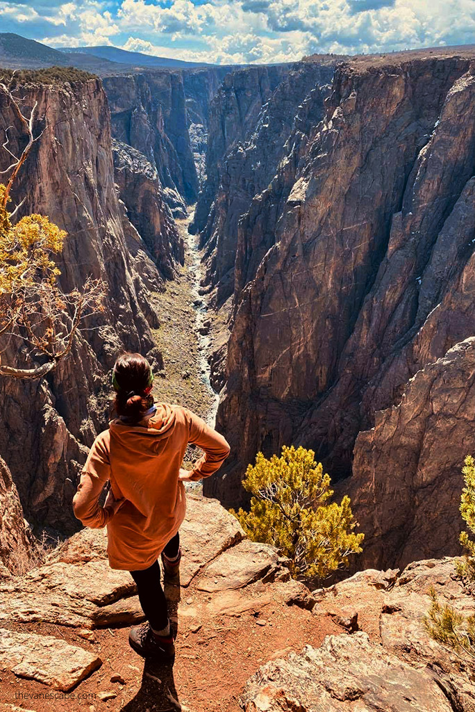 Agnes Stabinska, the author, is standing on tha edge in Black Canyon of the Gunnison National Park North Rim.