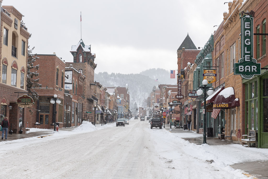 Deadwood in winter scenery - Eagle Bar and main street covered by snow.