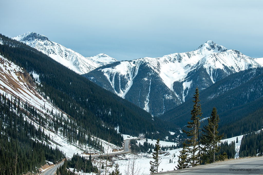Mountain scenery with peaks covered by snow on the Million Dollar Highway in Colorado.