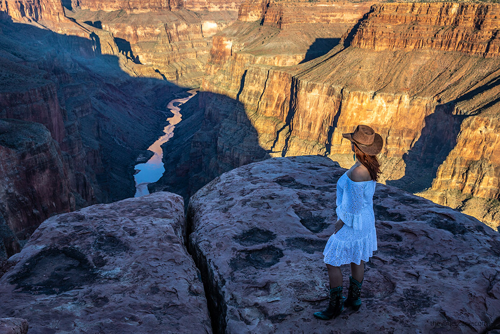 Trip to Toroweap Overlook - Agnes Stabinska admiring the view of Colorado River and cliff walls of the canyon.