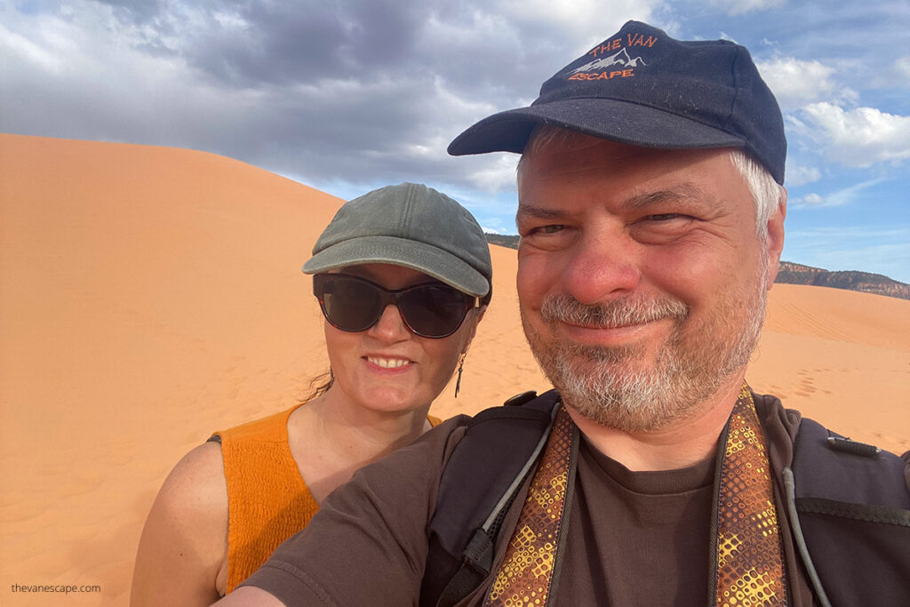Agnes Stabinska and Chris Labanowski, walking on dunes in Coral Pink Sand Dunes State Park.