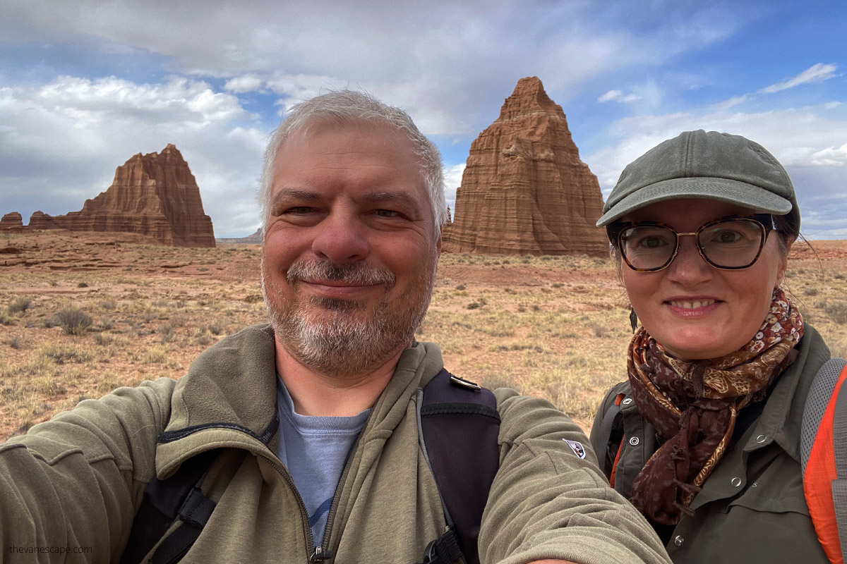 Agnes Stabinska and Chris Labanowski, the owners of the best USA road trips blog with stunning temple of the sun and temple of the moon in Cathedral Valley. 