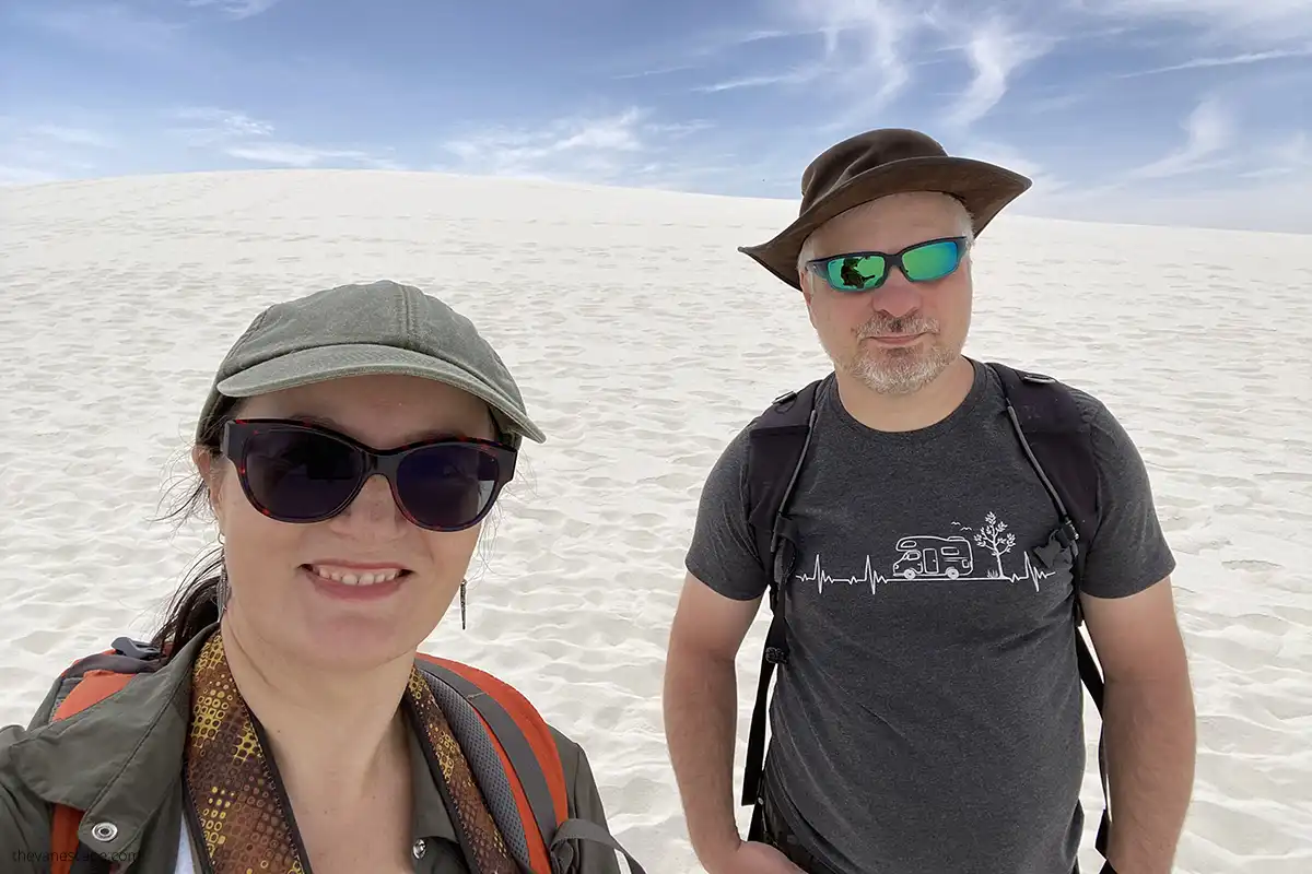 Agnes Stabinska and Chris Labanowski, owners of the best USA road trips blog, are hiking in White Sands National Park.