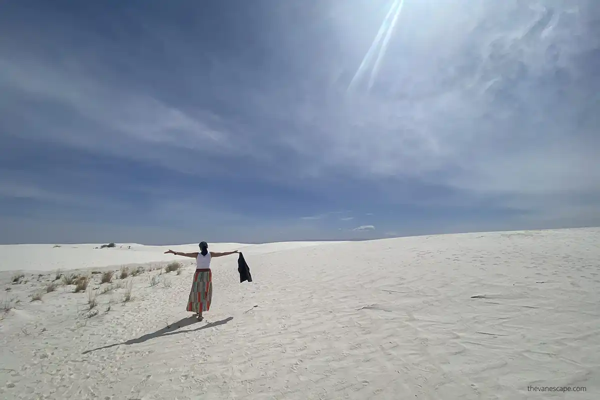Agnes Stabinska, the author, is visiting and enjoying white sands dunes during sunny spring day.