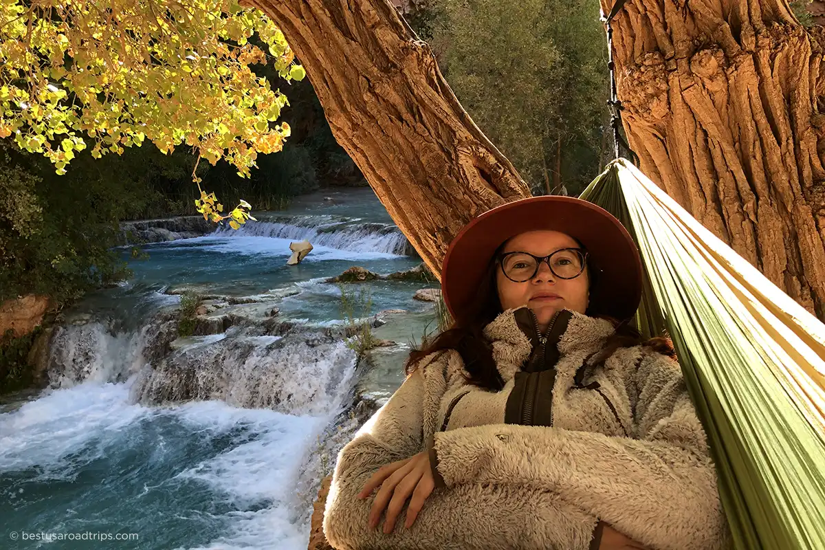 Agnes Stabinska relaxing in a hammock on a chilly morning, wearing a warm fleece jacket.