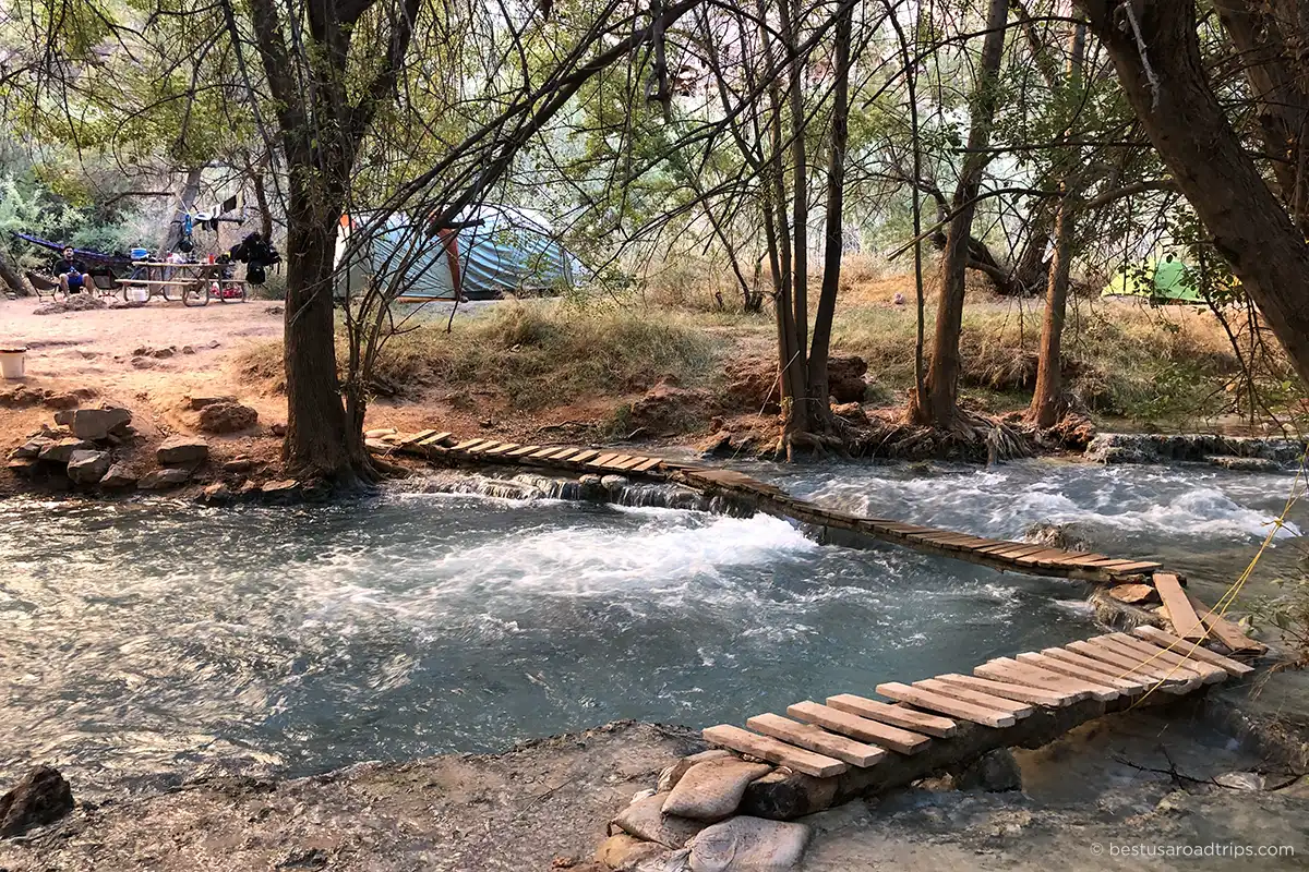 Havasupai campground with tents between trees.